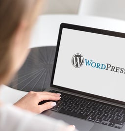 a laptop with WordPress on it