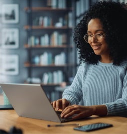 Woman working at a laptop