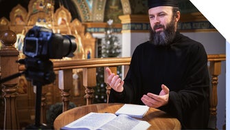 Orthodox priest films video