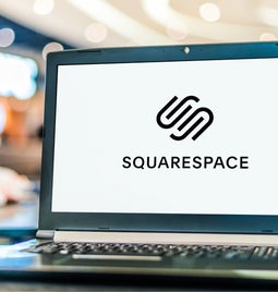 Laptop showing the Squarespace logo