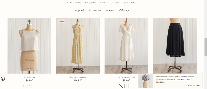 Screenshot of Adored Vintage's homepage with ecommerce section showcasing clothing.