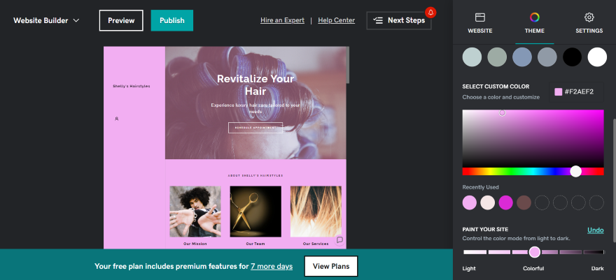 GoDaddy website builder in action, changing the color scheme of a hairstylist website