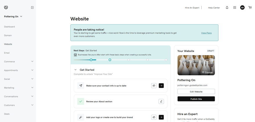 GoDaddy account dashboard for its website builder, showing a checklist of steps to help set up a website