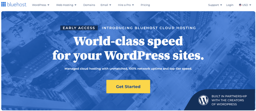 Web page banner for Bluehost Cloud Hosting, promising world-class speed for WordPress sites, with a blue overlay and a "Get Started" button.