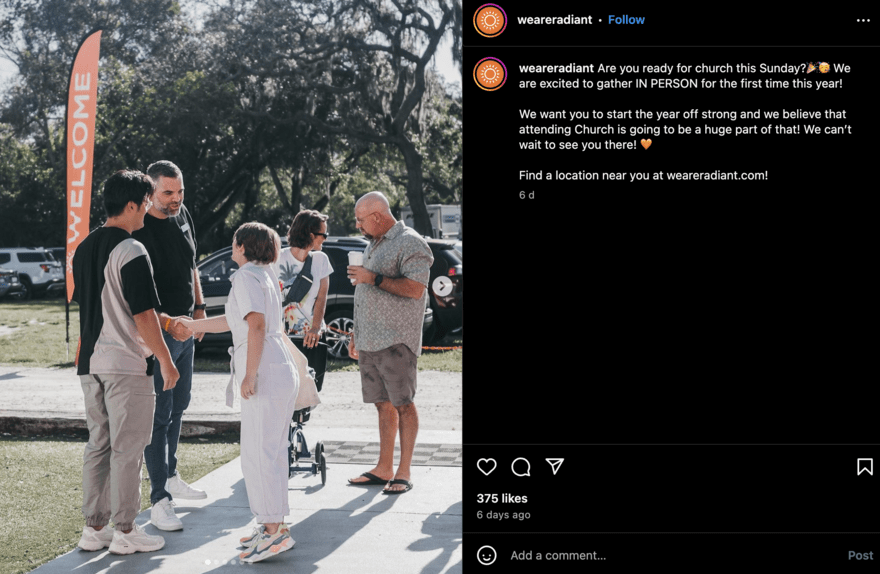 Photo of people greeting each other outside under a 'Welcome' banner at a church gathering with a social media caption expressing excitement for in-person services.