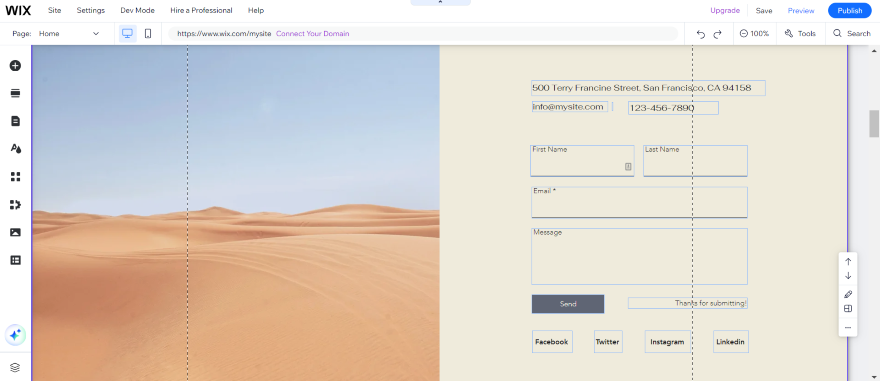 A serene desert landscape serving as the background for a contact form on a Wix website.